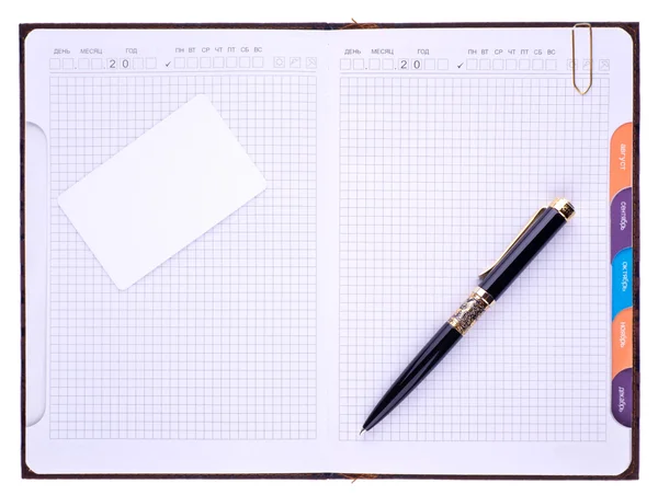 Notebook, pen en papier clip. Russisch — Stockfoto