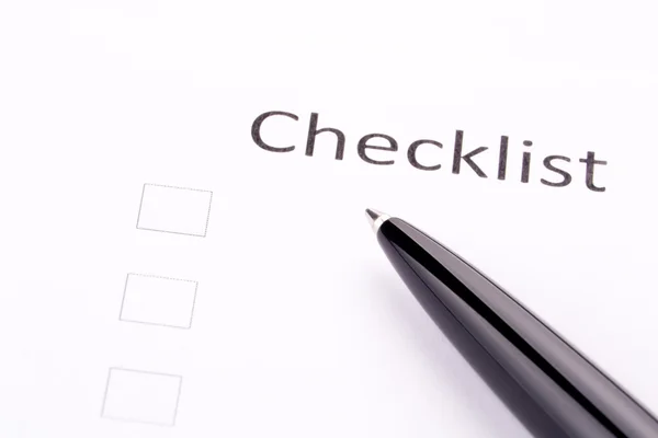 Pen on checklist — Stock Photo, Image