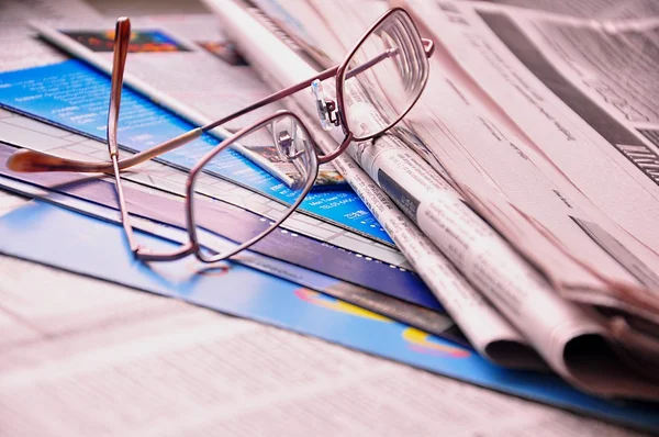 Glasses on a newspapers.Correspondence. — Stock Photo, Image