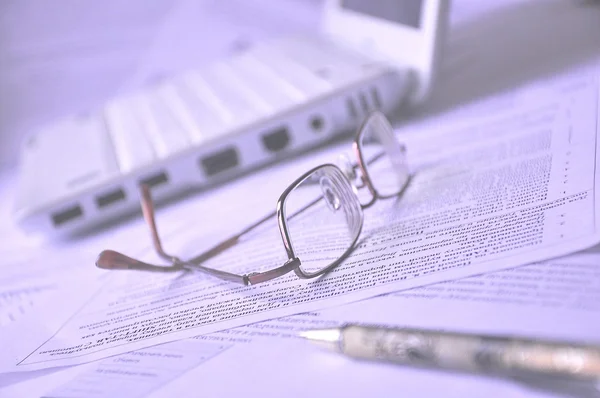 Image of workplace with documents , eyeglasses and notebook — Stock Photo, Image