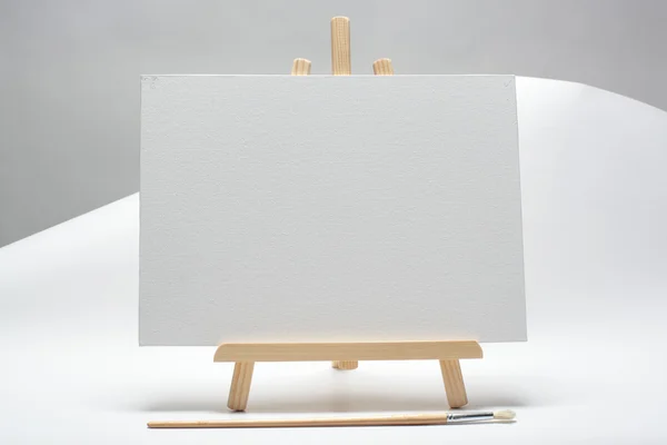 Blank canvas on easel isolate on white background — Stock Photo, Image