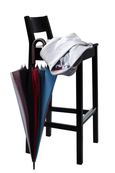 Schwarzer Stuhl und Regenschirm — Stockfoto