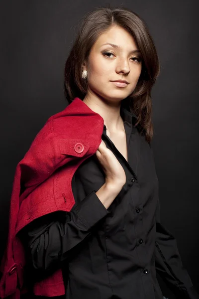 Retrato de una chica con chaqueta roja — Foto de Stock