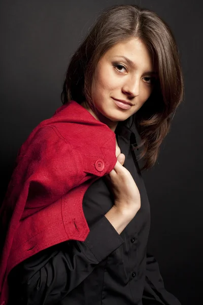 Retrato de una chica con chaqueta roja — Foto de Stock