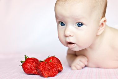 Lovely baby and strawberries clipart