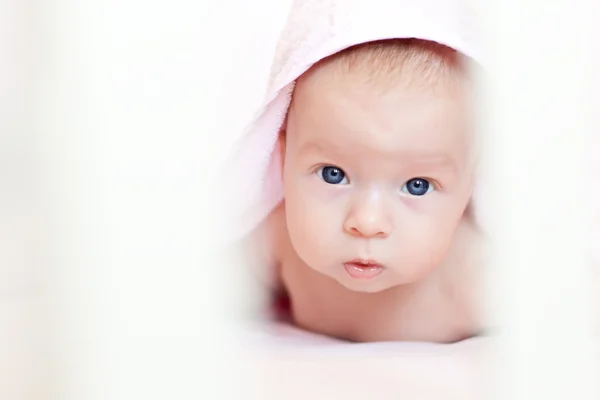 Lovely newborn in the hood — Stock Photo, Image