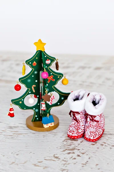 Christmas tree and Santa's boots — Stock Photo, Image