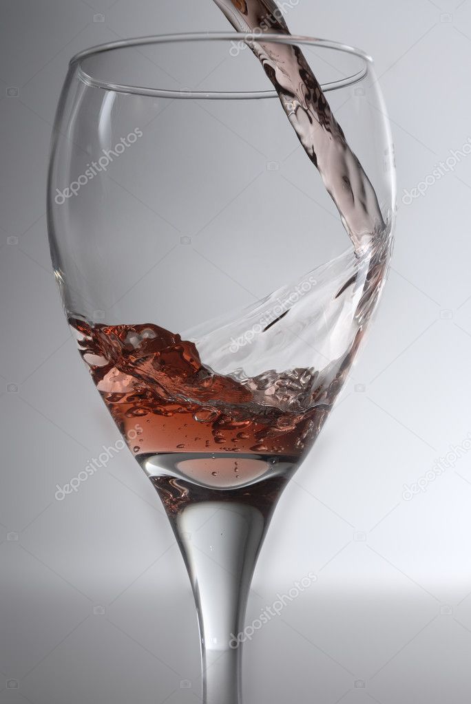 Pouring rose wine.