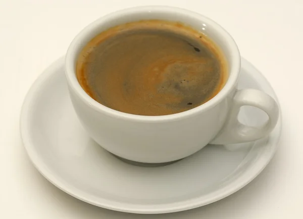 Uma chávena de café e pires . — Fotografia de Stock