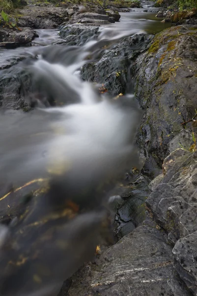 stock image Tight crop of fast moving stream.