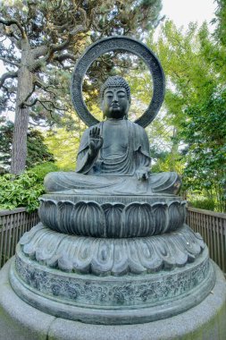 Bronze Buddha Statue in San Francisco Japanese Garden clipart