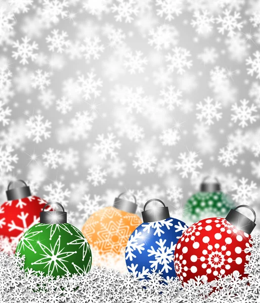 Kleurrijke sneeuwvlok ornamenten op sneeuw — Stockfoto
