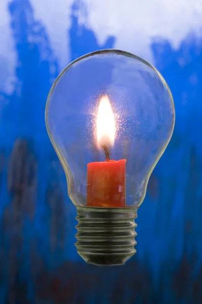 Candle in bulb — Stock Photo, Image