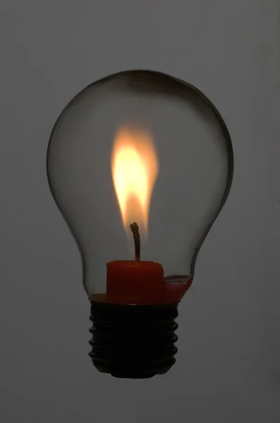 stock image Candle in bulb