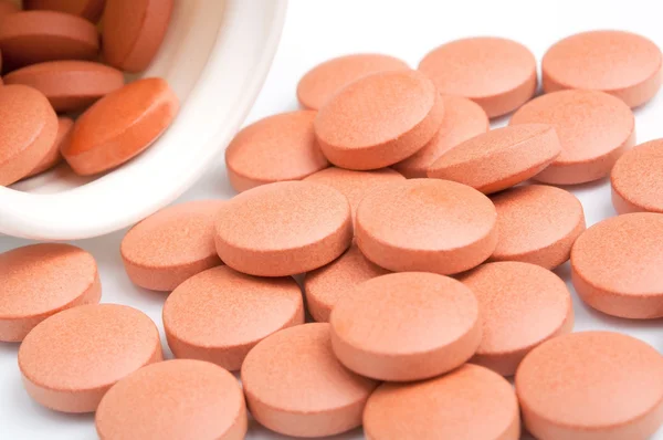 Stock image Orange pills close-up