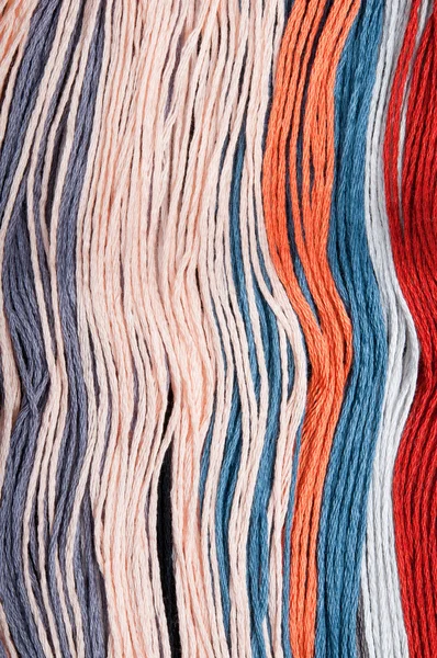Multicolore ricamo fili sfondi — Foto Stock