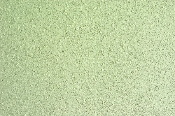 Светло-зеленая цементная стена — стоковое фото