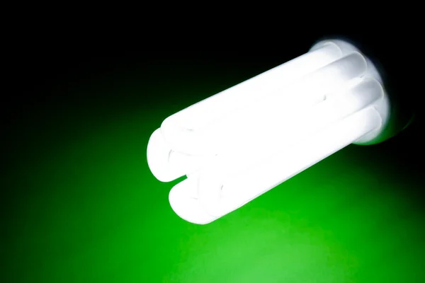 Glödande energibesparing glödlampa — Stockfoto