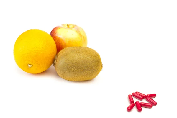 Choice between fruit or pills — Stock Photo, Image