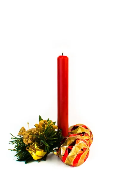 Closeup of beautiful red Christmas candle and christmas balls — Stock Photo, Image