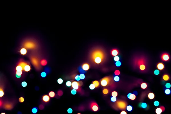 Luci di Natale colorate astratte sfocate — Foto Stock