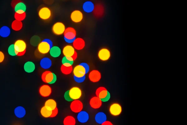 カラフルなクリスマス ライトをデフォーカス — ストック写真