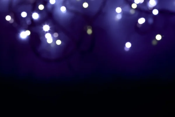 Defokussierte abstrakte blaue Weihnachtsbeleuchtung — Stockfoto