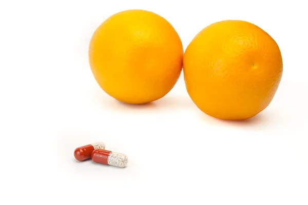 Cuidado natural y artificial con naranja —  Fotos de Stock