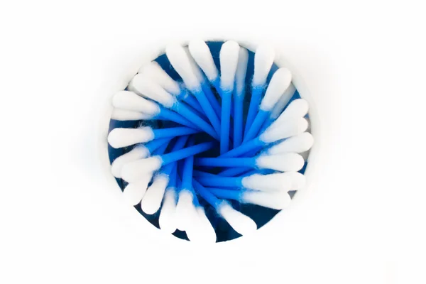 Container filled with cotton buds — Stock Photo, Image