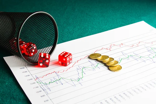 Five dice and coins on financial chart — Stock Photo, Image