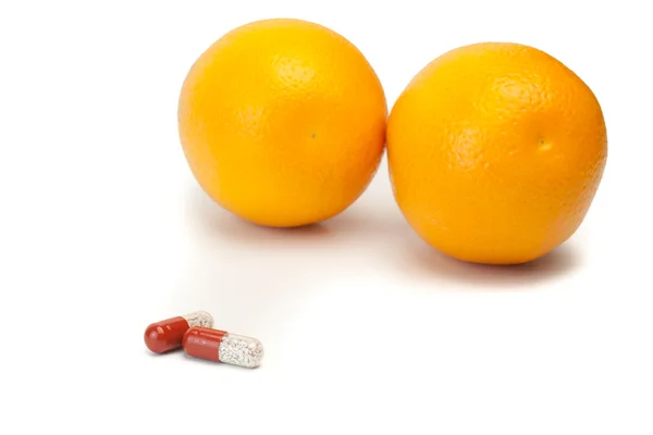 Natural and artificial care with orange — Stock Photo, Image