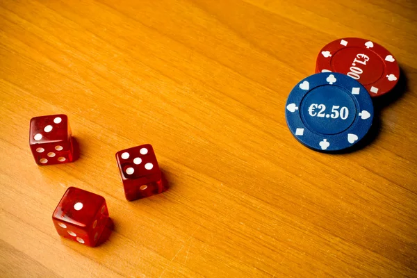 Dice and gambling chips — Stock Photo, Image