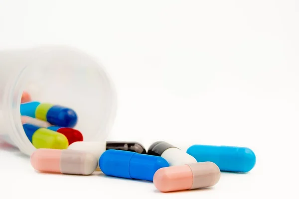 Pílulas coloridas para cuidados médicos — Fotografia de Stock