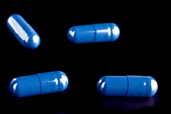 Blue pills for medical care — Stock Photo, Image