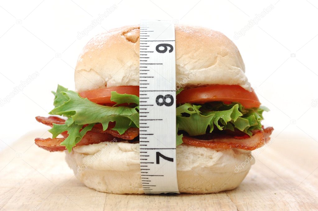 Burger and measuring tape