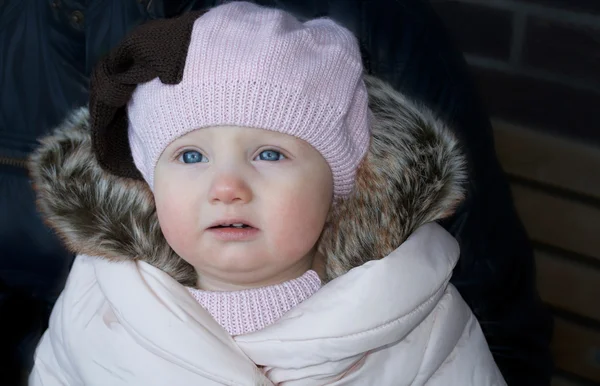A beautiful baby girl in winter outfit — Stock Photo, Image