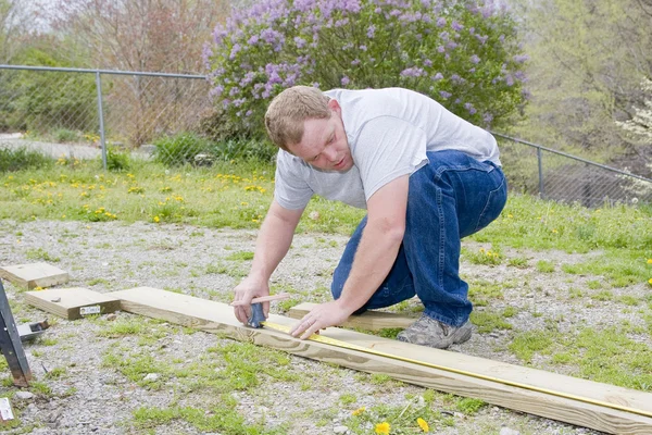 Carpenter building porch rail — Stock Photo, Image