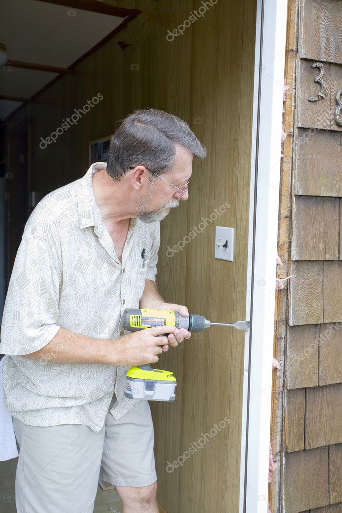 Elderly carpenter working