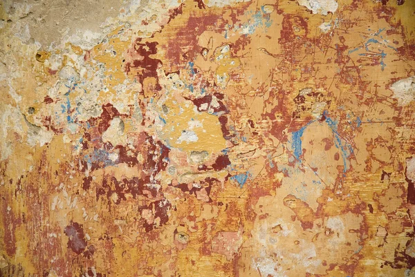 Descascamento textura da pintura com várias cores quentes — Fotografia de Stock
