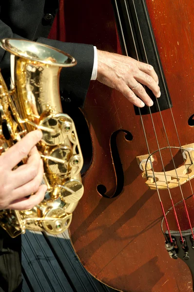 stock image Musicians playing instruments in the sun