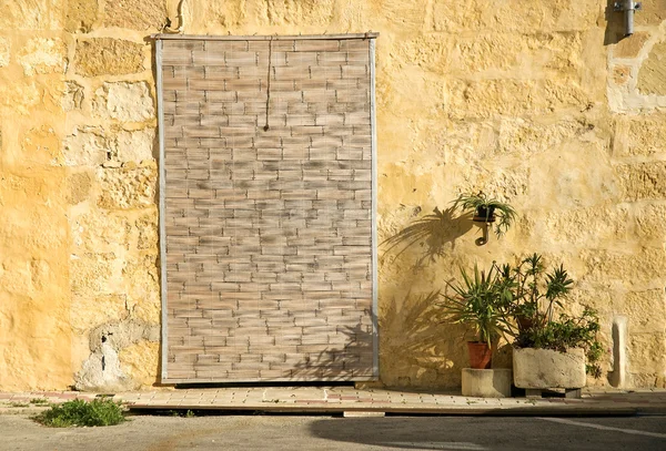 Mediterranean house with shutters in malta — Stock Photo, Image