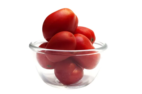 Tomatos in a glass bowl — Stock Photo, Image