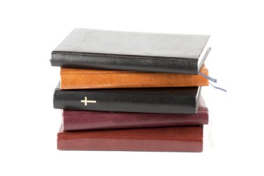 Holy Bible between books clipart