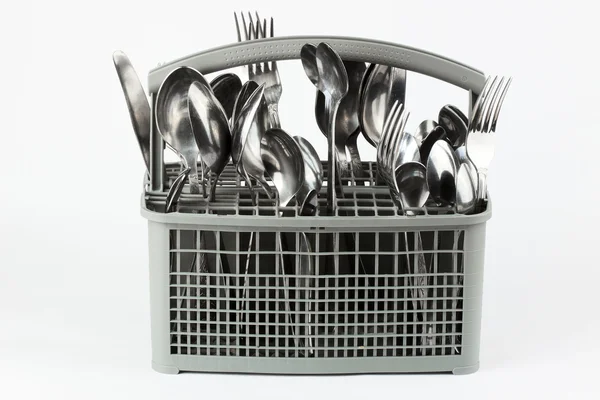Tenedores y cucharas en la cesta —  Fotos de Stock