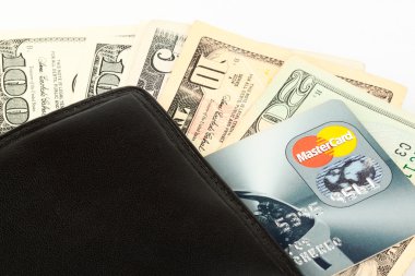 Money and credit card in a wallet clipart