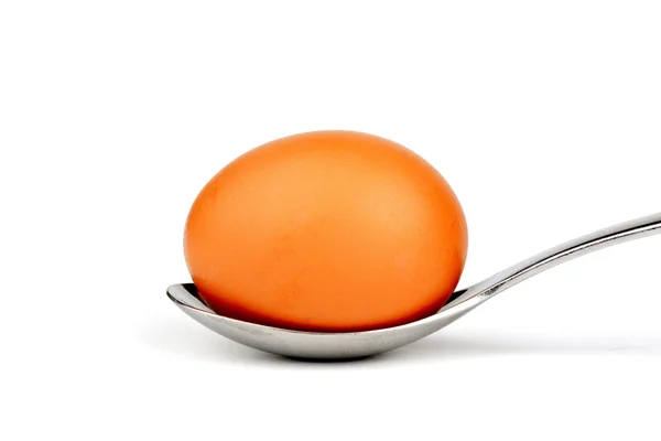 Egg on the spoon — Stock Photo, Image