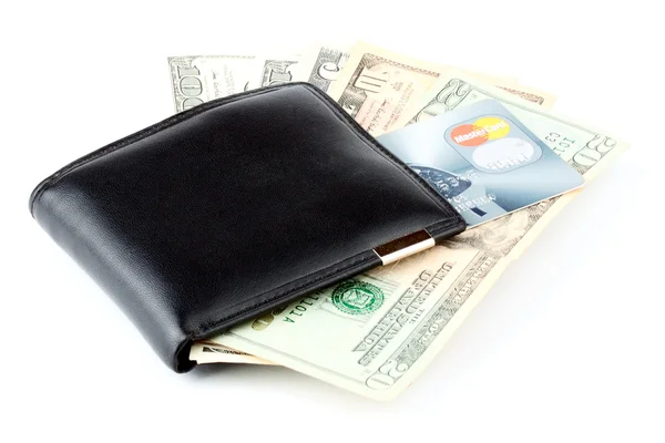 Dinero y tarjeta de crédito en una cartera —  Fotos de Stock