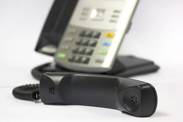 Telefono IP con ricevitore in primo piano — Foto Stock