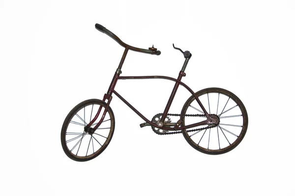 Старый изолированный велосипед Стоковое Фото