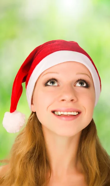Weihnachtsfrau schaut auf — Stockfoto